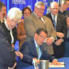 Gov. Dannel Malloy signs legislation securing Sikorsky's future in Connecticut through 2032.