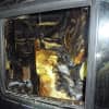The fire-damaged interior of a Range Rover in which a Wilton man was pulled from by Wilton Police officers before fire engulfed it.