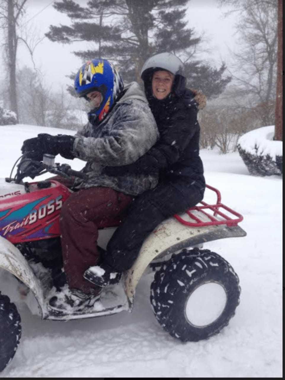 Danbury residents Theresa Wiblishauser and Michael Stuart riding in the snow