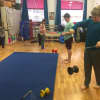 Kids have a great time practicing their circus skills