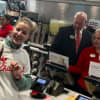 And they're open! One of the first customers at the new Chick-Fil-A in Norwalk snaps a selfie as she gets her breakfast on Thursday at the grand opening.