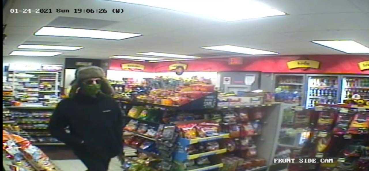 The person in this photo is wanted by police in connection with 5 convenience store robberies. Police are asking for the public's help in ID'ing the person.