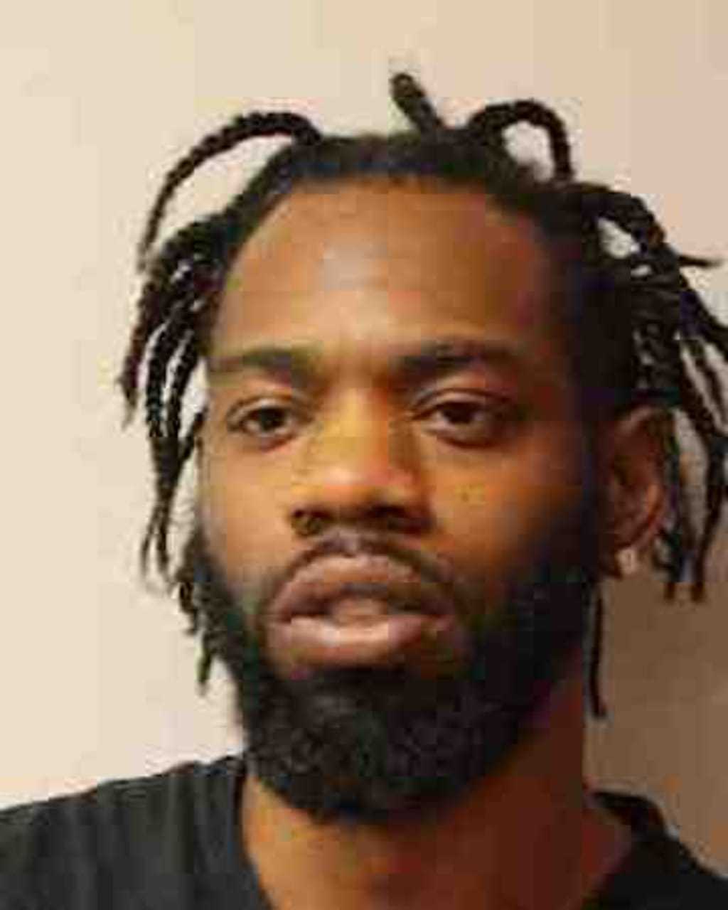 Hyde Park Man Nabbed With Defaced Semi-Auto Pistol, Police Say