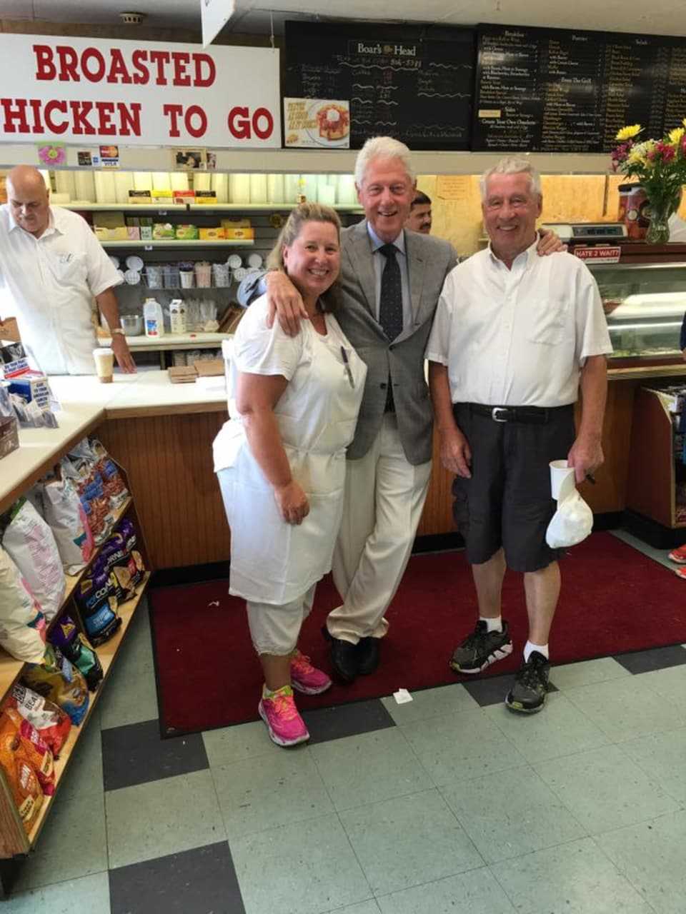 Bill Clinton poses for a photo with Vicki Bergstrom and Richard Lange at Lange's Little Store & Delicatessen in Chappaqua earlier this week.