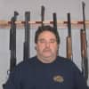 Dan DeLuca, co-owner and operations manager of MD Shooting Sports, a firearms business, wants to run an online operation out of a house in Shelton.