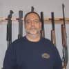 Mike DeLuca, co-owner and general manager of MD Shooting Sports, a firearms business, wants to run an online operation out of his Shelton house.