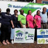 A group of female employees from Suez helped paint and install insulation at a newly built house in Bergenfeld as part of Habitat for Humanity of Bergen County's annual Women Build in Bergenfield.
