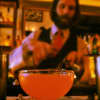 General Manager Clark Moore pouring a cocktail at Harper's in Dobbs Ferry.