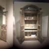 Before (left) and After (right). One-hundred year old doors from India were transformed into a cabinet. Artists worked diligently to match the new back and shelves to the original.