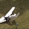 <p>The plane crashed near the Candlelight Farms Airport in New Milford. It had taken off early from Danbury Municipal Airport. Aerial photo courtesy of NBC Connecticut.</p>