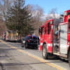 Multiple fire crews respond to a two-alarm blaze at the Goldens Bridge Fire Station on Monday morning.
