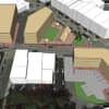 A downtown design view of DRGs first proposed development scenario for the Village of Ossinings Market Square and parking lots at the intersection of Main and Spring Streets
