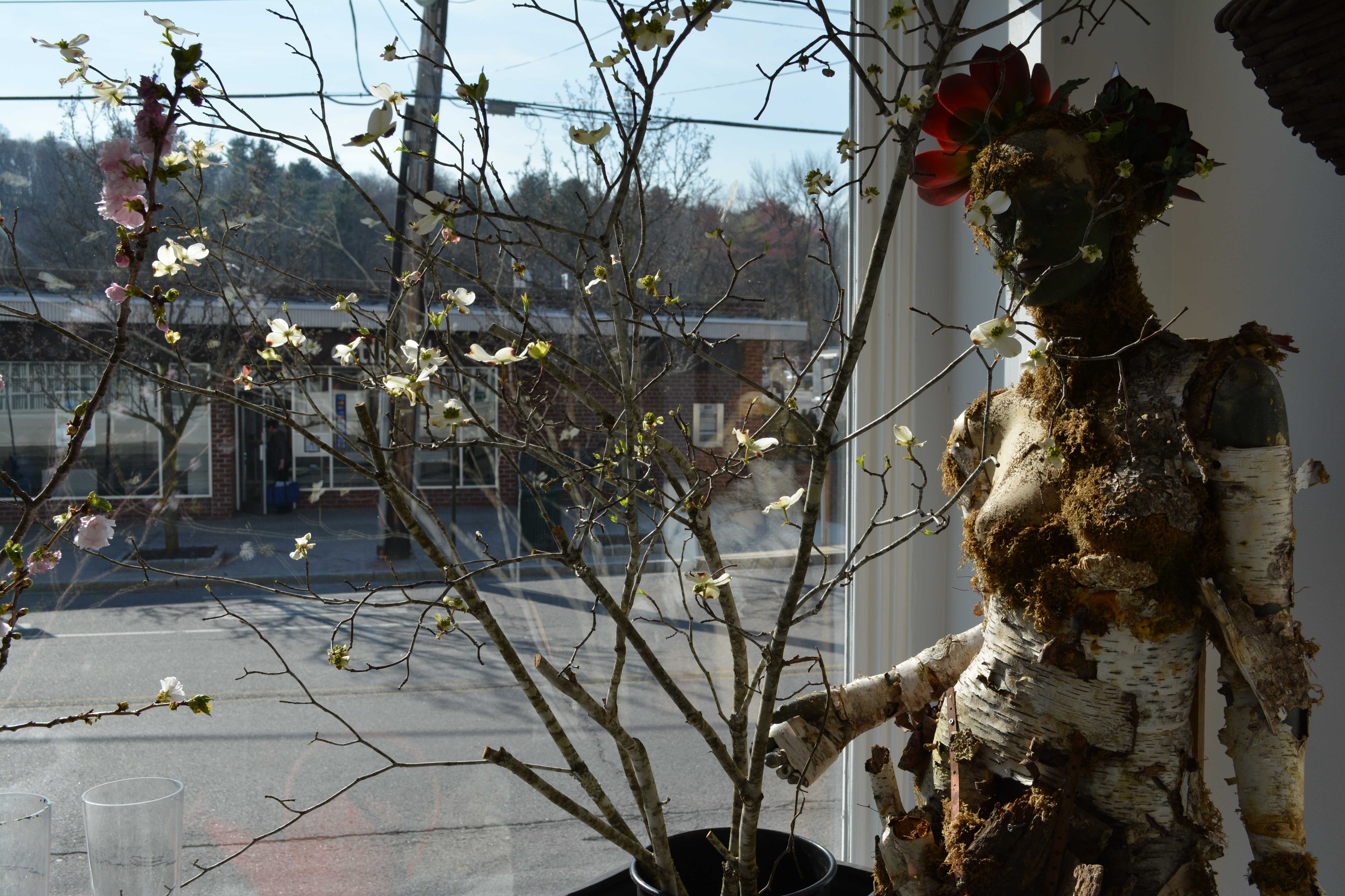 The mannequin Anastasia is displayed by the window of Whispering Pines.