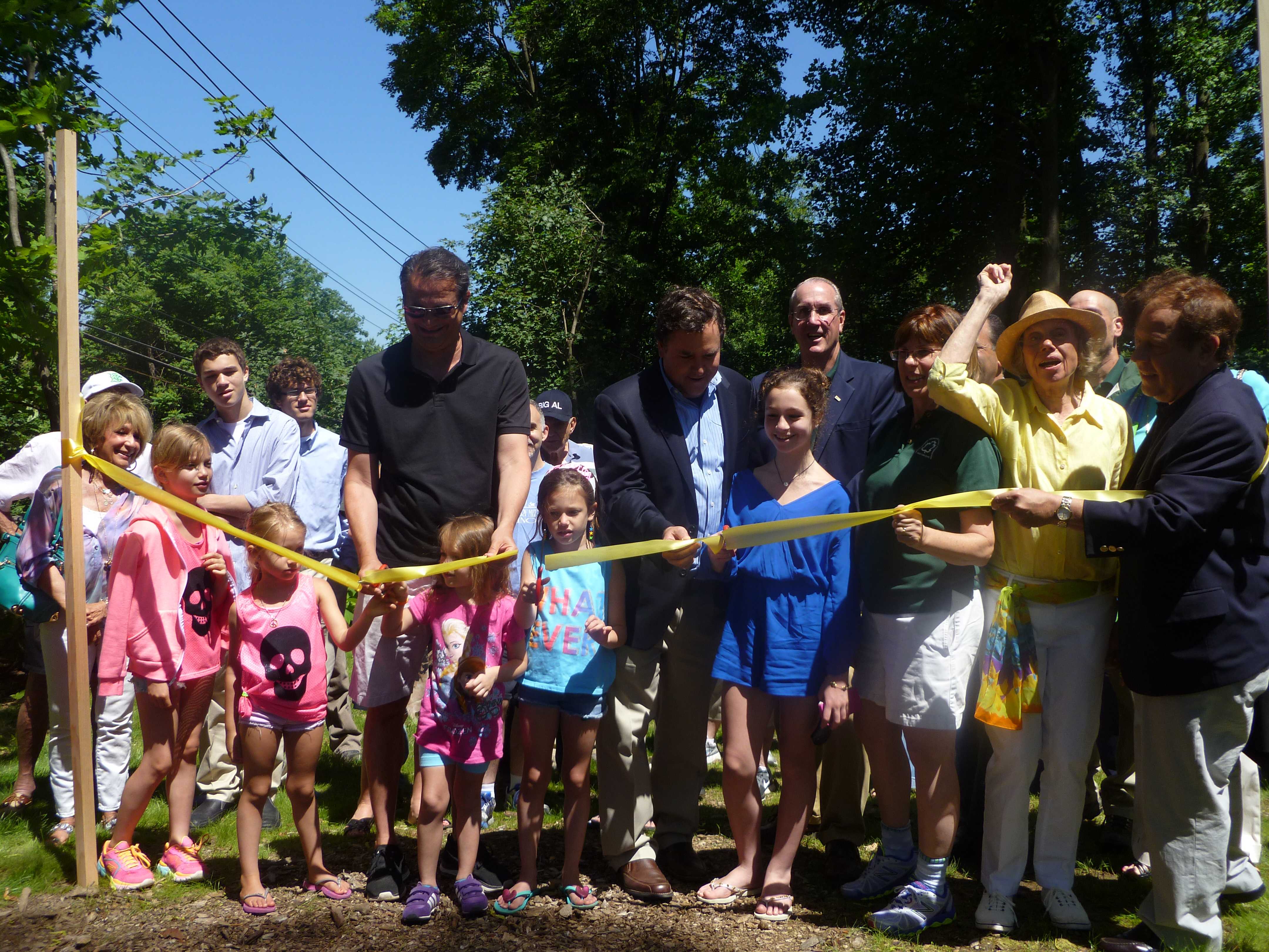 Andt Todd's daughters cut the ribbon on the link between Lyndhurst and Gracemere Park. 