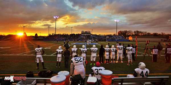 The setting sun makes for a beautiful backdrop at the Section 1 football championships at Mahopac High School in November 2013.