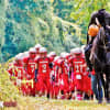 The Sleepy Hollow football team and its legendary mascot take the field for their annual showdown against rival Ossining this past fall.