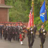 Wilton firefighters and police officers march in the tribute held Thursday morning in honor of those who died in the Sept. 11 attacks.