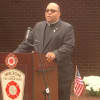 Rev. Reginald Norman of Our Lady of Fatima Parish offers a prayer for the victims of Sept. 11.