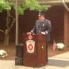 Former Wilton Firefighter Jason Mumbach pays respects to the victims of Sept. 11.