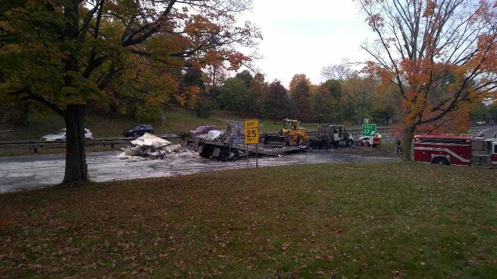 The cleanup continues into the late afternoon in Greenwich. 