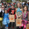 Children gathered for the Eastchester Raggamuffin parade and were provided candy and special giveaways. 