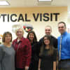 The staff of Optical Visit in their new Eastchester home. 