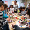 <p>First-graders at Carrie E. Tompkins Elementary School in Croton-Harmon celebrated the beginning of the holiday season by creating candy houses with their parents.</p>