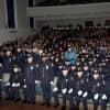 The 138th basic police recruit class at Friday's graduation. The officers standing were recognized for prior military service.