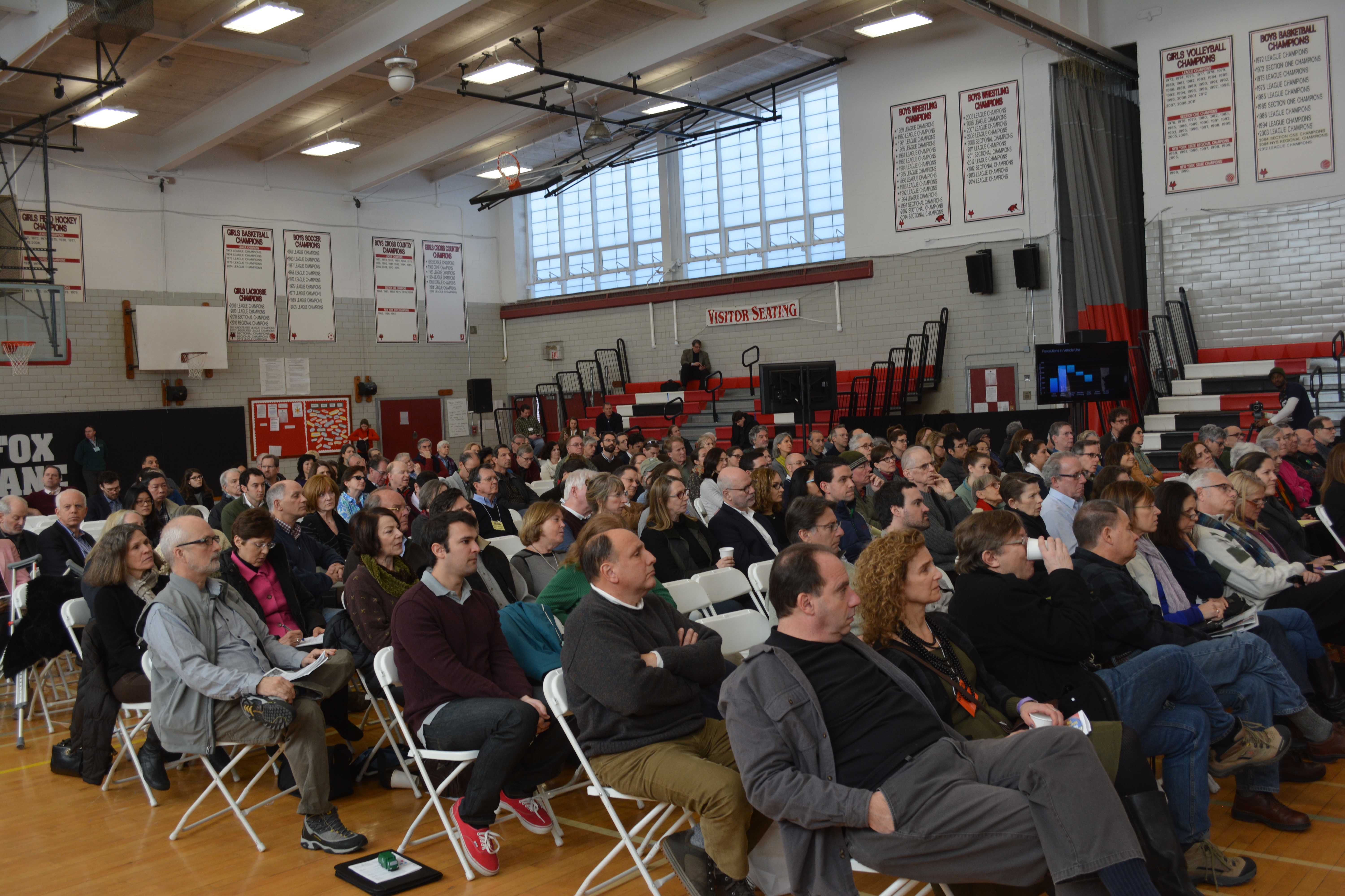 A large crowd attends an address by Amory Lovins, co-founder of the Rocky Mountain Institute.