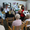 Guests at Waveny LifeCare Network in New Canaan listen to a talk at the "Around the World" event.