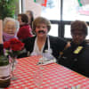 Seniors in the Waveny LifeCare Networks Adult Day Program enjoy a bistro lunch on around the world day. 