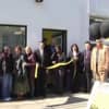 Members of the Eastchester-Tuckahoe Chamber of Commerce at a ribbon cutting for Hertz.
