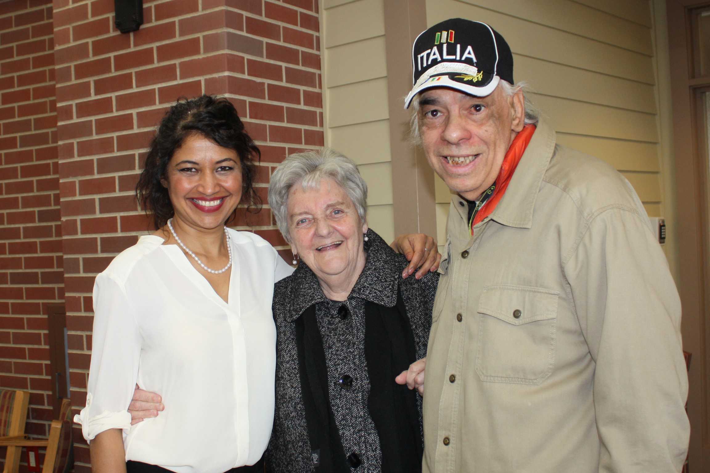 Cooking Channel personality Bal Arneson poses with residents of Main Street at The Village in New Canaan