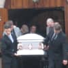Pall bearers carrying Lacey Carr's casket at her funeral Friday.