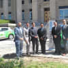 New Rochelle and Nissan officials unveiling the new GreeNR vehicles.