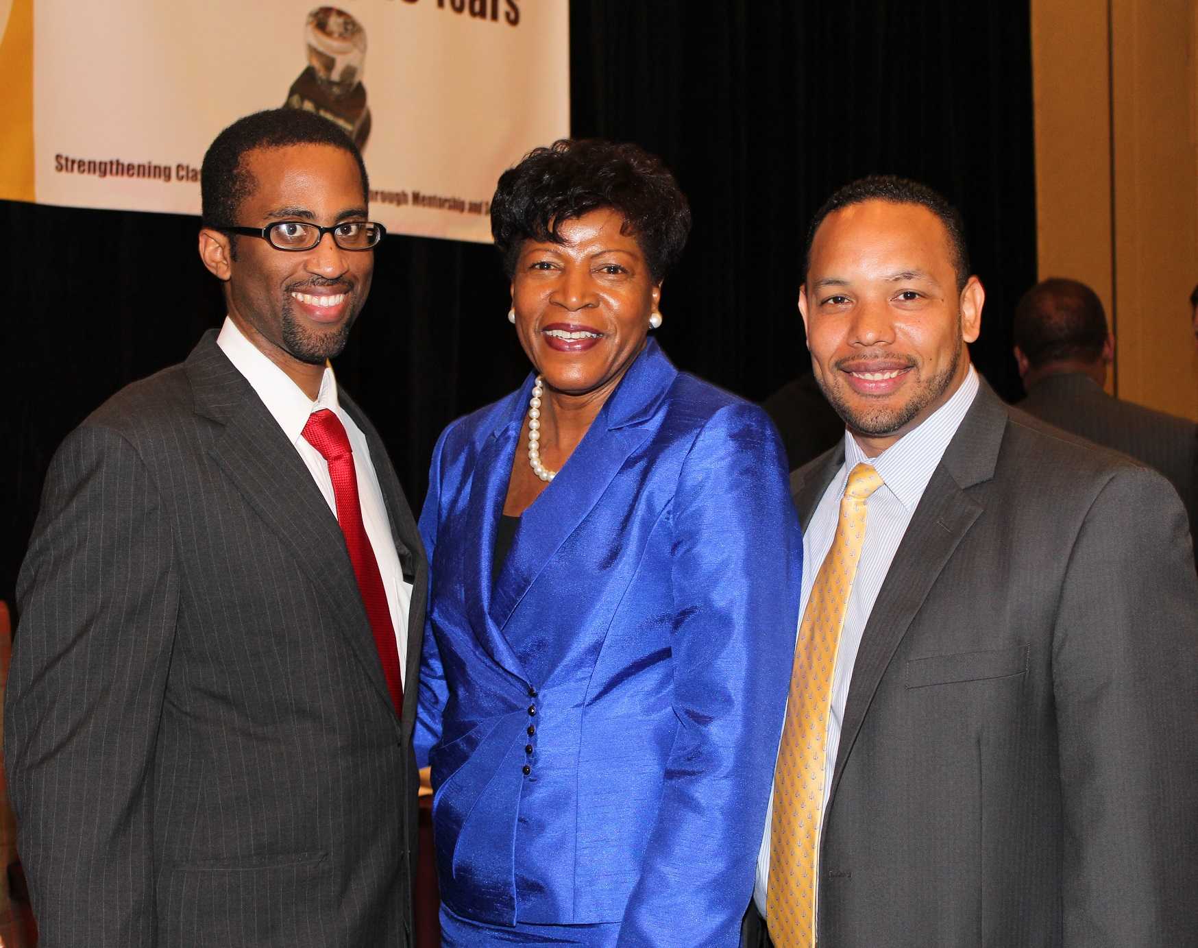 Award recipients Jeffrey Cole (left) and Emerly Martinez (right) with Bettye  Perkins (center). 