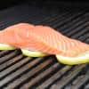 Use lemon slices on the grill to place seafood or chicken on.