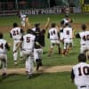 The Mamaroneck High School baseball team celebrates its 8-6 victory over Roy C. Ketcham on Saturday to take the Section 1 Class AA title. The Tigers' advanced to the State quarterfinal playoff game on Friday.