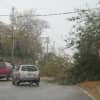 Cars turn back or go around a fallen tree on Pelham Road near the New Rochelle Marina in the aftermath of Hurricane Sandy Tuesday.