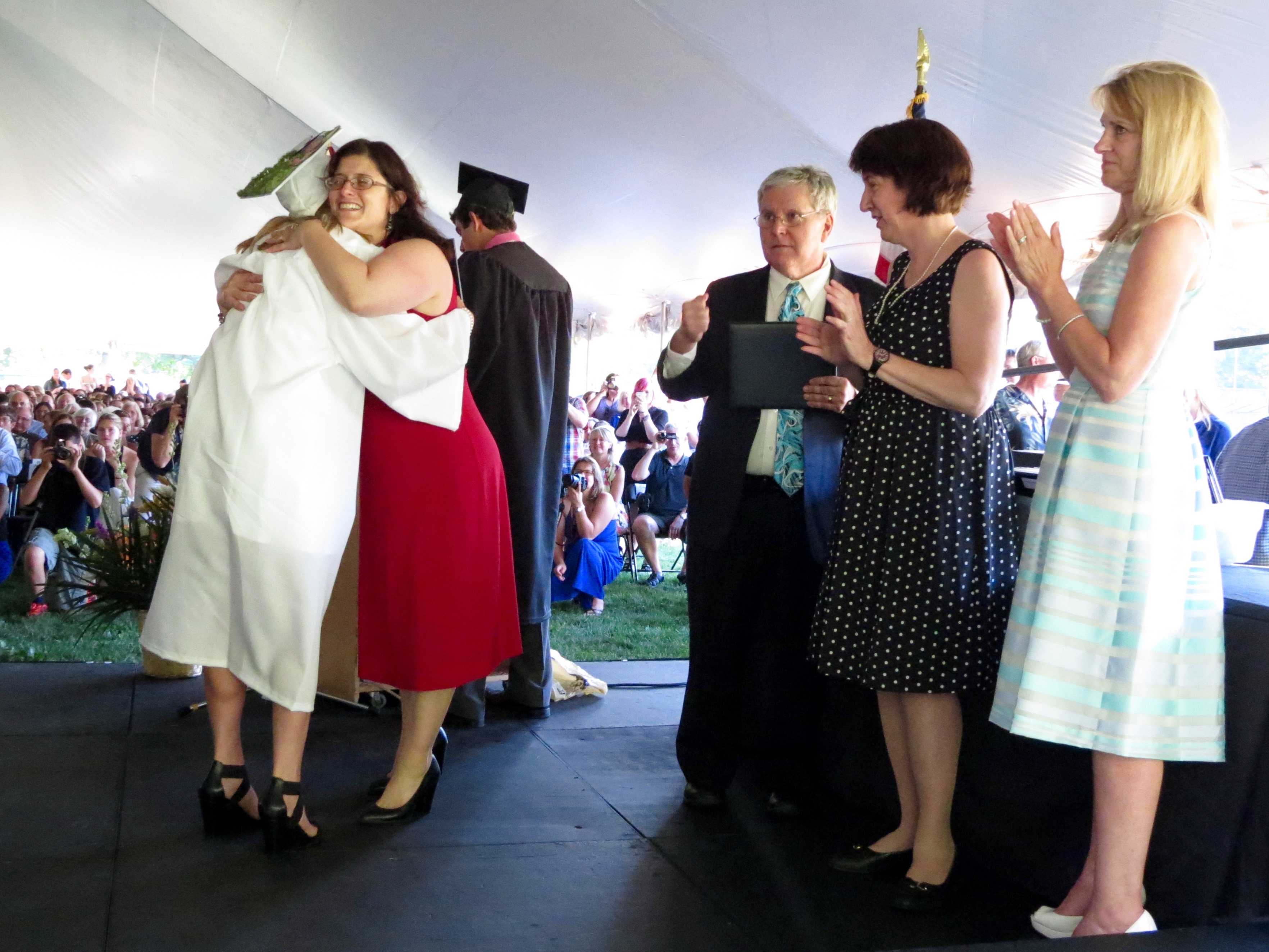 Friends and family congratulate the graduates on their four years' work.