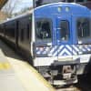 A Metro-North train rolls out of the White Plains station Saturday. People displaced by Hurricane Sandy-related power outages were heading home throughout the Metropolitan New York area as electricity was restored to many areas.