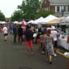 The crowd checks out the various tents at New Canaan's sidewalk sale Saturday.