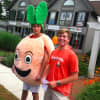 Someone's gotta do it: On a warm, muggy morning these two young men are promoting Peachwave frozen yogurt.