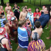 <p>Bedford Hills coach Alex Vidal gets his team psyched up prior to Saturday morning&#x27;s NWSC meet against Ossining.</p>