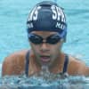 Nicole Marcatoma, of Ossining, competes in the breast stroke.