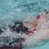 <p>Courtney Reilly, 12, of Bedford Hills, competes in back stroke.</p>
