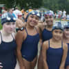 <p>A few of the Ossining swimmers pose for a photo.</p>
