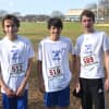 Wilton runners (left to right) Ben Ruffing, Owen Callahan and Aaron Breen get together before their race.
