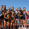 Darien's Julia Cornacchia, standing second from left, celebrates with teammates after winning a bronze medal at the World Junior Championships. Cornacchia rows for the Connecticut Boat Club of Norwalk.