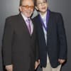 Eastchester student Paul Evangelista poses with ASCAP Foundation President Paul Williams.